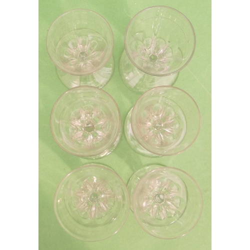 124 - A Set of 6 Georgian Trumpet Shaped Wine Glasses having engraved rims, hexagonal stems on round sweep... 