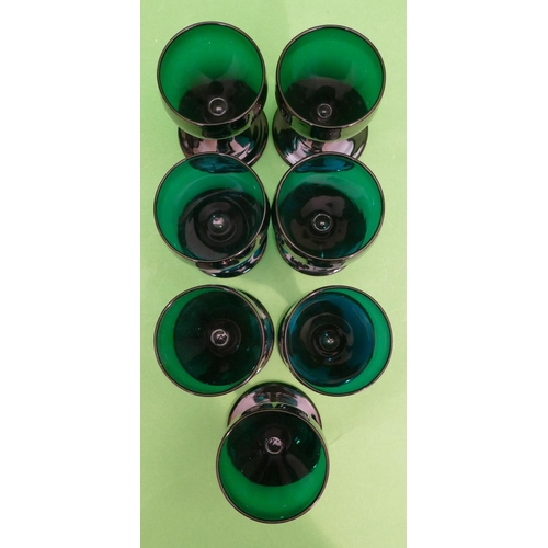 133 - 6 x Similar Green Wine Glasses having bulbous shaped bowls on round sweeping bases, 12.5cm high (7).