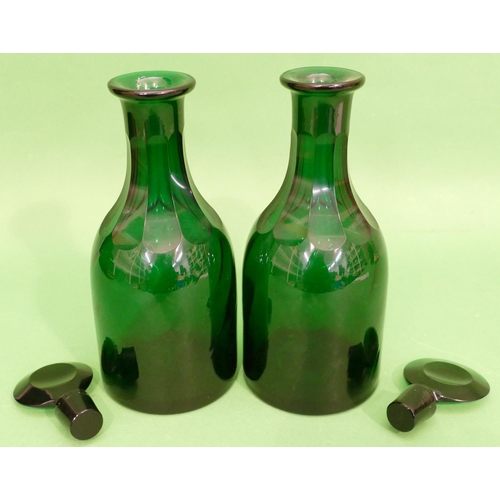 136 - A Pair of Georgian Green Glass Decanters with flat stoppers having thumb pattern necks (slight chip ... 