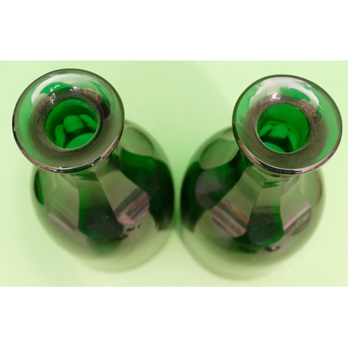 136 - A Pair of Georgian Green Glass Decanters with flat stoppers having thumb pattern necks (slight chip ... 