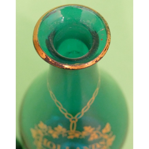 137 - A 19th century Pale Blue Round Bulbous Thin Necked Decanter with flat stopper, having gilt vine deco... 