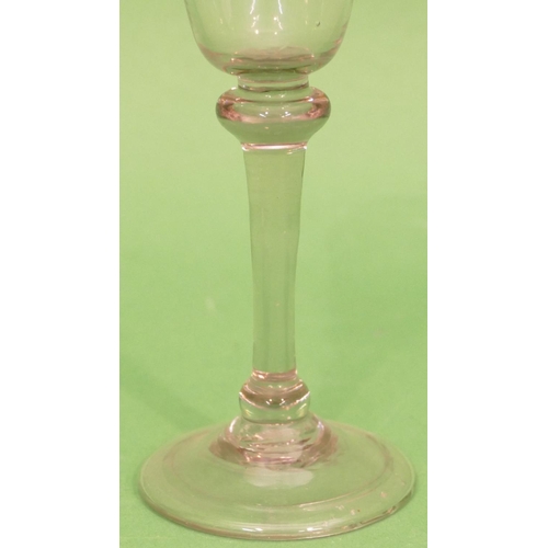 147 - A Georgian Round Trumpet Shaped Cordial Glass having knob stem on round sweeping foot, 15.5cm high.