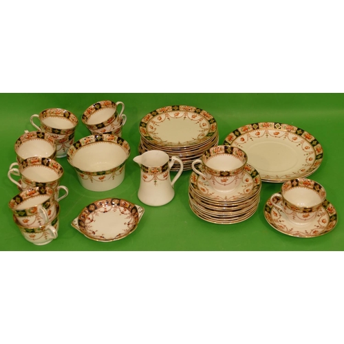 151 - A China Tea Service on white ground having black, red and green, floral, swag and gilt decoration, c... 