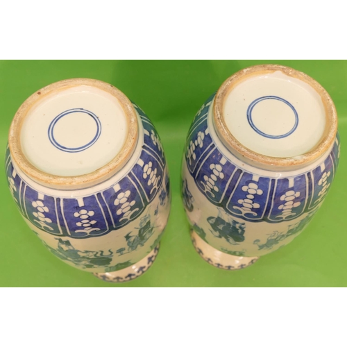 187 - A Pair of Chinese Blue and White Round Bulbous Thin Necked Trumpet Shaped Vases having all over vari... 