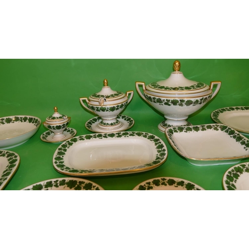 188 - A Continental H&C China Service on white ground having green vine decoration comprising lidded soup ... 