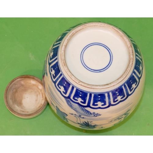 215 - An Oriental Blue and White Round Bulbous Shaped Lidded Ginger Jar having figure decoration, 18cm hig... 