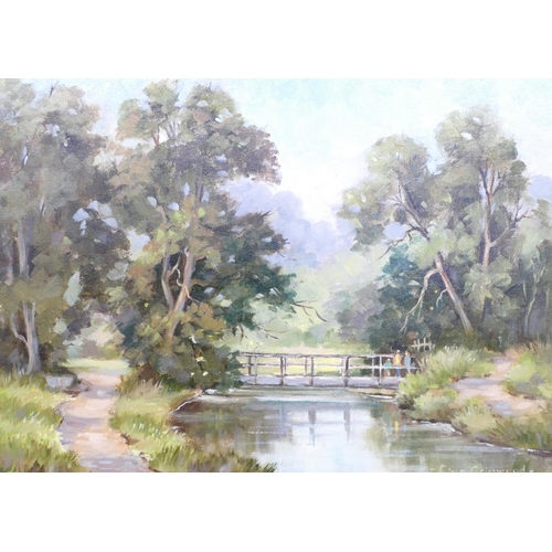 239 - Gina Grimwood, Oil on Canvas depicting figures crossing bridge, in woodland, signed in gilt frame 29... 