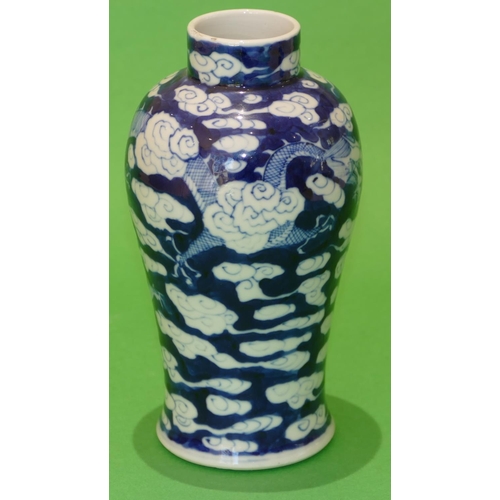 27 - A 19th Century Chinese Blue and White Round Bulbous Thin Necked Vase having dragon and cloud decorat... 