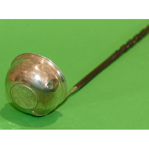 299 - A George III Silver Punch Ladle having twist horn handle inset with silver coin (no marks).