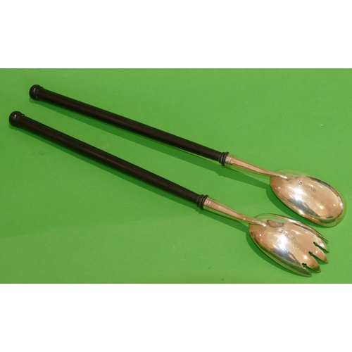 300 - A Pair of Edward VII Silver Salad Servers having ebony handles, Birmingham 1906, maker A&J Zimmerman... 