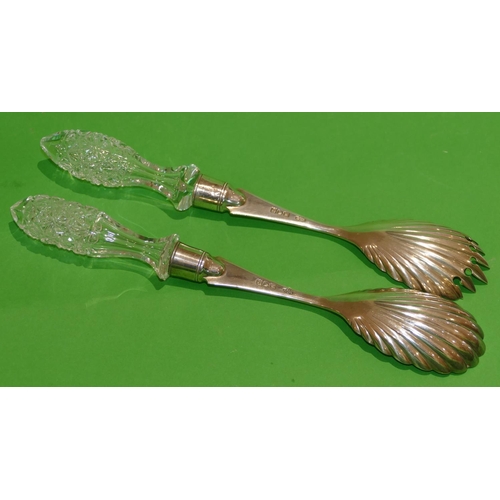 304 - A Pair of Edward VII Silver Salad Servers having cut glass handles with shell shaped bowls, London 1... 