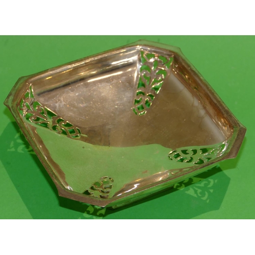 309 - A Sheffield Silver Square Sweet Meat Dish having pierced decoration on sweeping base, 15.5cm wide, 4... 