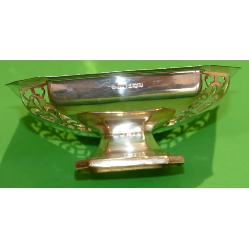 309 - A Sheffield Silver Square Sweet Meat Dish having pierced decoration on sweeping base, 15.5cm wide, 4... 