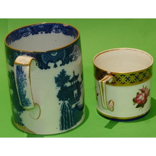 46 - A 19th Century Derby Mug on white and blue ground having hand painted rose, leaf and gilt decoration... 