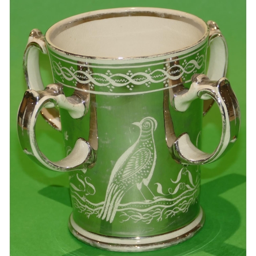 47 - A Wedgwood Style Silvered 4 Handled Loving Cup depicting Stag, bird, floral and scroll decoration, 1... 