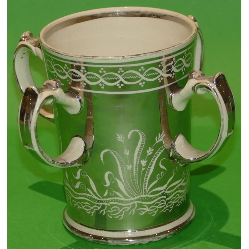 47 - A Wedgwood Style Silvered 4 Handled Loving Cup depicting Stag, bird, floral and scroll decoration, 1... 