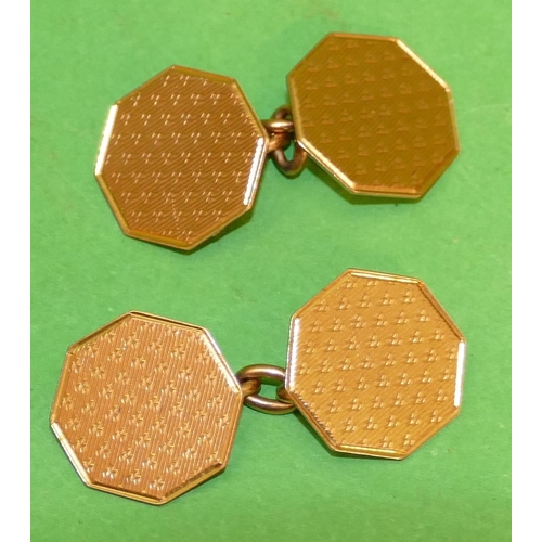 529 - A Pair of 9ct Gold Octagonal Shaped gentleman's Cufflinks having engine turned decoration, 5.1g.