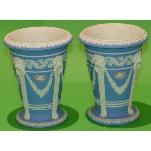 60 - A Pair of Wedgwood Jasperware Round Trumpet Shaped Urns having raised plaques, swag, lion head ring ... 