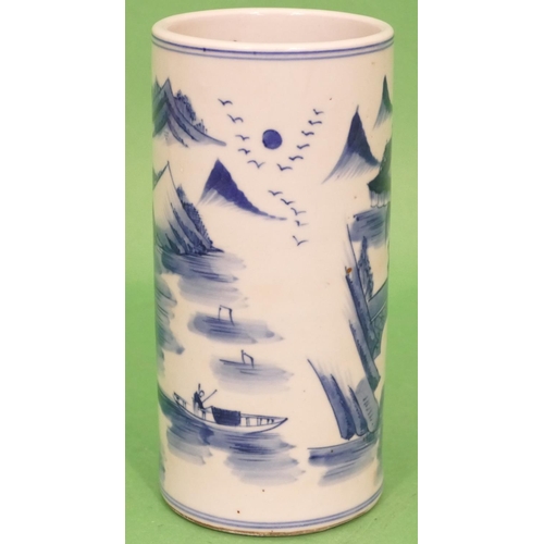 65 - An Oriental Blue and Blue Cylindrical Brush Pot depicting figure and river landscape decoration, 18c... 