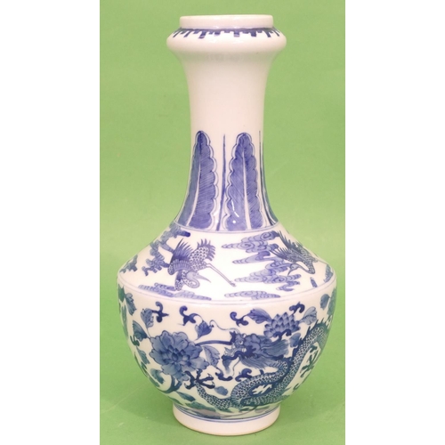 67 - An Oriental Blue and White Round Bulbous Thin necked Trumpet Shaped Vase having dragon, phoenix and ... 