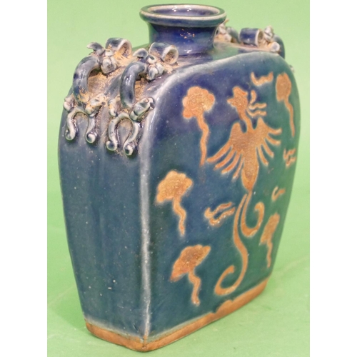 70 - An Oriental Blue Glazed Earthenware 2 Handled Vase having phoenix decoration, 16cm high.