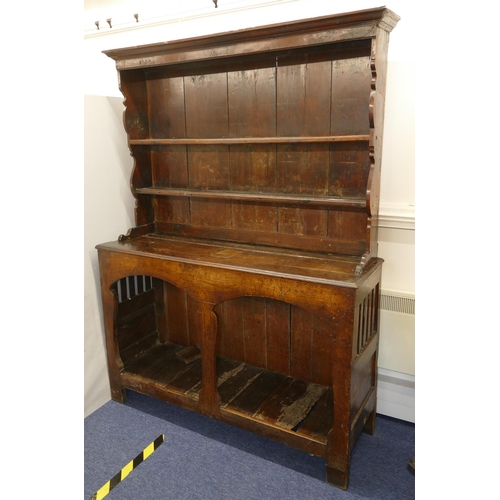 968 - An 18th Century Oak Dresser having shelf back, open cupboard below, with shaped splat to centre, hav... 