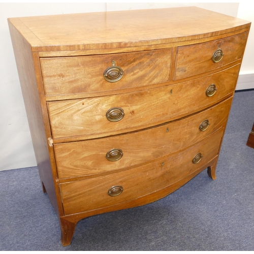 969 - A 19th Century Mahogany Bow Fronted Chest of Drawers having part inlaid stringing, 2 drawers, 3 long... 