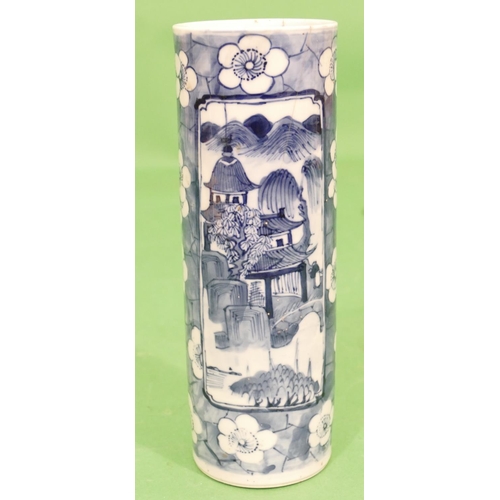 108 - A 19th Century Chinese Cylindrical Vase on blue and white ground with river landscape, building and ... 