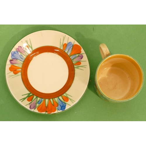 113 - A Clarice Cliff, Bizarre Crocus Pattern Coffee Can and Saucer.