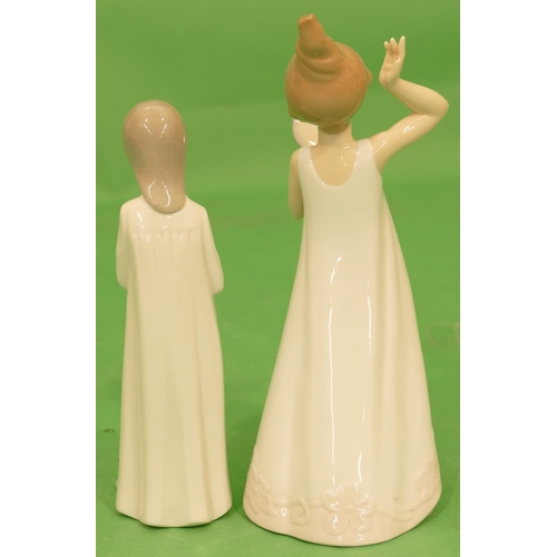 137 - 2 x Nao Figures, young girl looking in hand mirror, 24cm high and a young girl in nightdress, 19.5cm... 