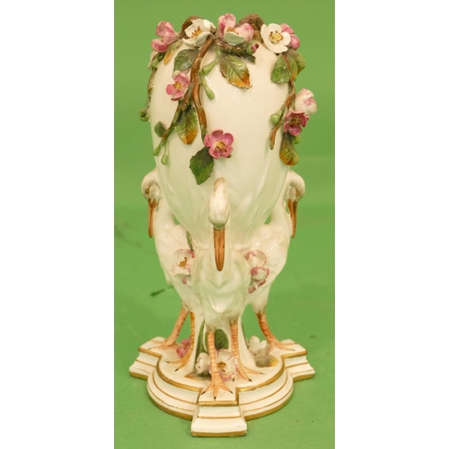 154 - A Bradley Vase in form of 3 storks supporting encrusted bowl on tripod base, having all over floral ... 