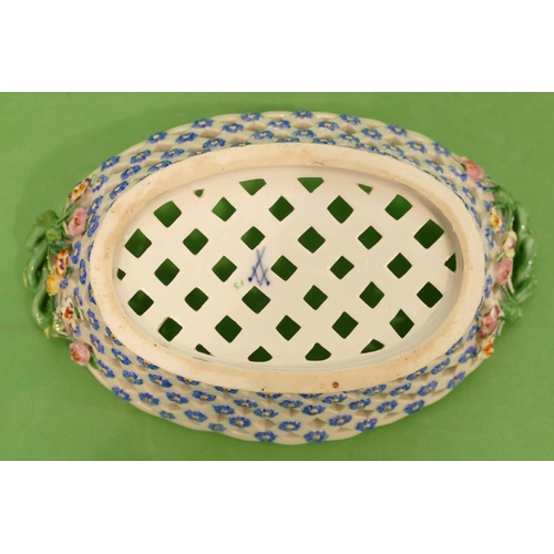 165 - A Meissen Oval Basket having all over pierced and encrusted floral decoration, entwined twist handle... 