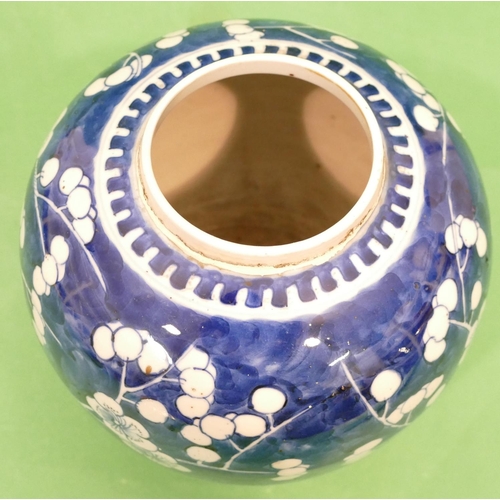 183 - A 19th Century Chinese Round Bulbous Ginger Jar on blue and white ground having all over branch and ... 