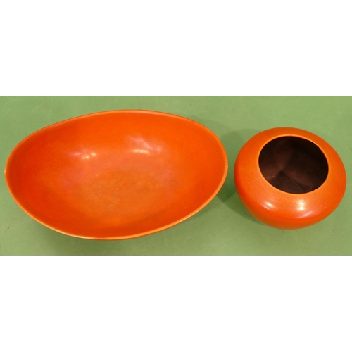 185 - An Ashtead Pottery Oval Bowl on orange ground 26cm wide, also a similar Ashtead pottery small round ... 