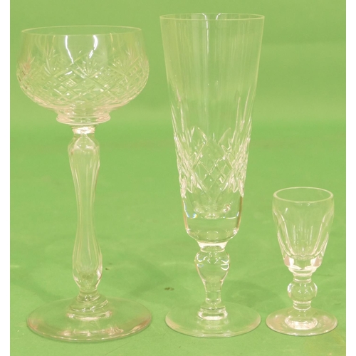 21 - A Set of 6 Clear Hock Glasses having cut bowls, chamfer stems on round bases, 18cm high, a set of 8 ... 