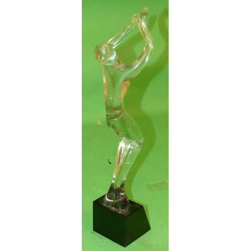 211 - An R Austin Murano Glass Sculpture of a standing figure on black platform base, signed, 50cm high.