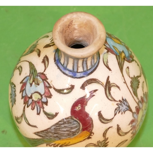 218 - An Eastern Round Bulbous Thin Necked Vase on cream ground with multicoloured, bird, floral and leaf ... 