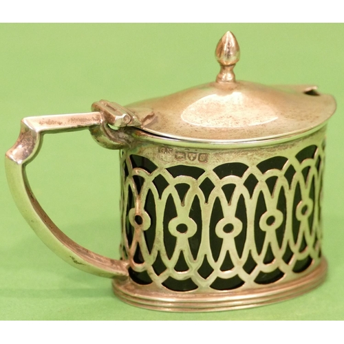 298 - A Sheffield Silver Oval Mustard Pot having hinge lid with blue glass liner, 0.9oz.