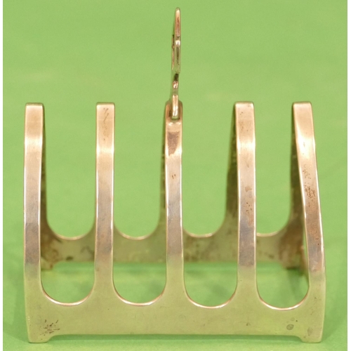 306 - A Sheffield Silver 5 Bar Toast Rack having centre carrying handle, 7.5cm wide, 1.6oz.