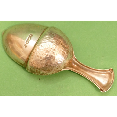 307 - A George V Silver Caddy Spoon in form of an acorn, Sheffield 1934, makers mark T.B&S.