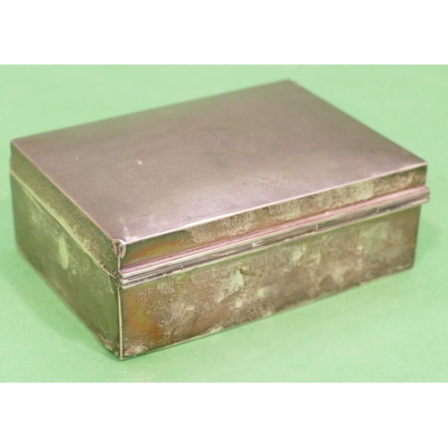 309 - A Birmingham Silver Cigarette Box having engine turned hinge lid, 11.7cm wide.