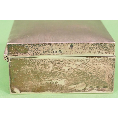 309 - A Birmingham Silver Cigarette Box having engine turned hinge lid, 11.7cm wide.