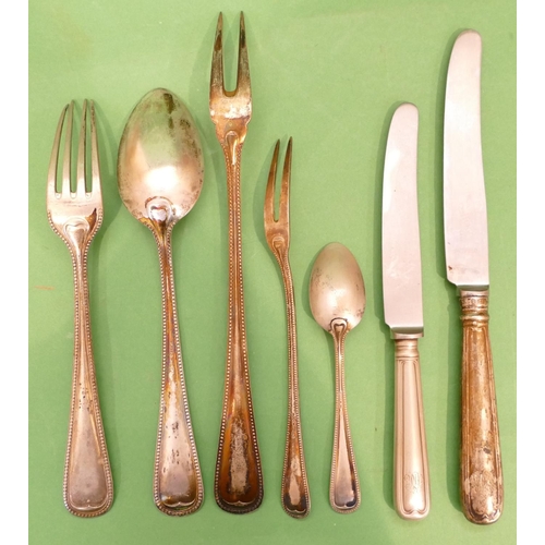 318 - An 800 Silver Coloured Continental Metal Flatware Service having ball rims, comprising 4 various ser... 