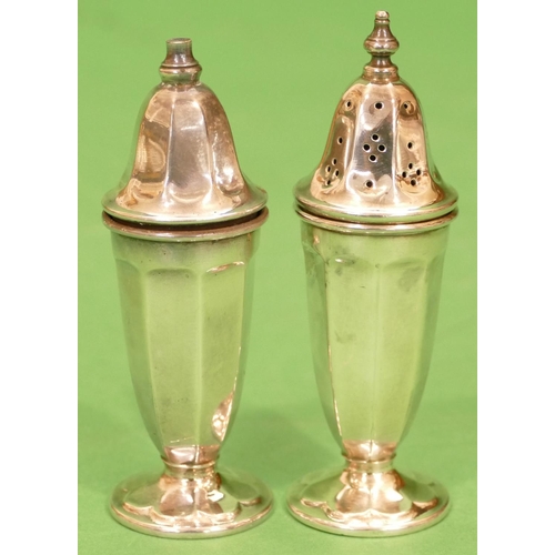 324 - A Pair of Sheffield Silver Bulbous Shaped Salt and Pepper Pots having chamfer decoration on round sw... 