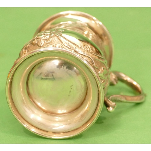 332 - An Edward VII Silver Round Bulbous Shaped Christening Mug having scroll handle with all over embosse... 