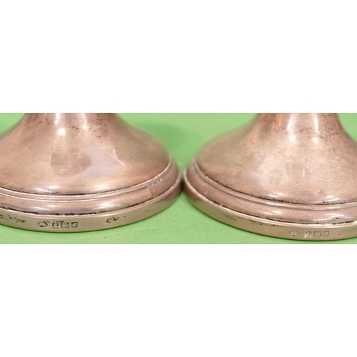 354 - A Pair of Birmingham Silver Dwarf Candlesticks, round sweeping bases, 10cm high.