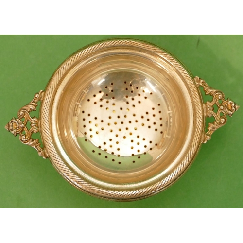 364 - A Birmingham Silver Round 2 Handled Tea Strainer with odd Birmingham silver bowl, 2.4oz.