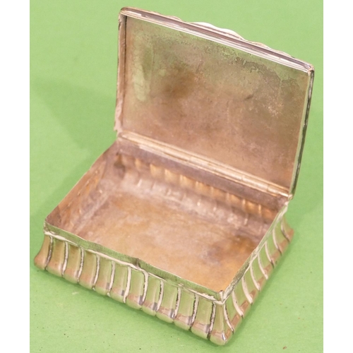 403 - A Continental Silver Coloured Metal Rectangular Shaped Snuff Box having hinge lid with embossed deco... 