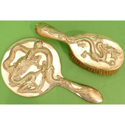 408 - A Chinese Silver Coloured Metal Had Mirror having raised dragon motif with matching brush, stamp WH ... 