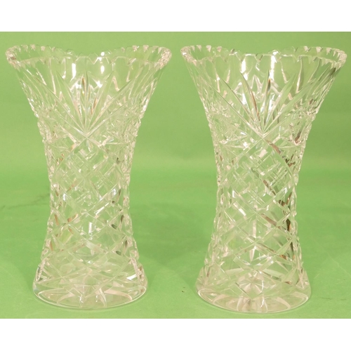 41 - A Pair of Cut Glass Round Bulbous Trumpet Shaped Vases having tooth cut rims, 26cm high (2).